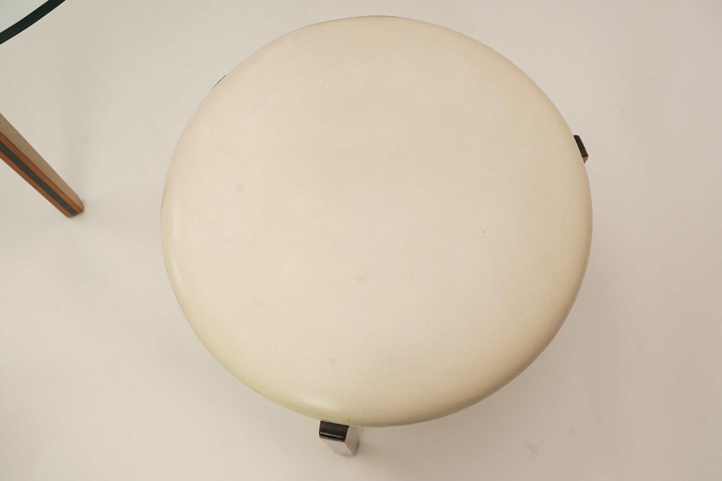 Sven Ellekaer (Danish, 1926-1984) for Christian Linneberg Møbelfabrik: A coffee table and three nesting stools ensuite